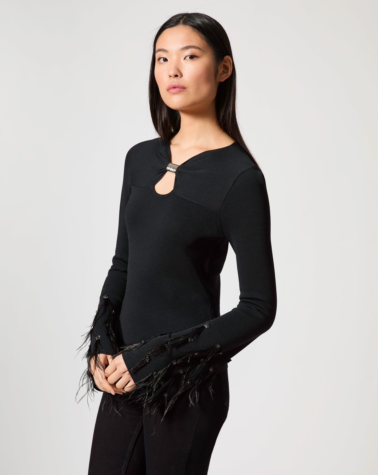 Feather Cuff Long Sleeve Top